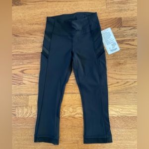 NWT LULULEMON illumina crop black run pant side pockets 2